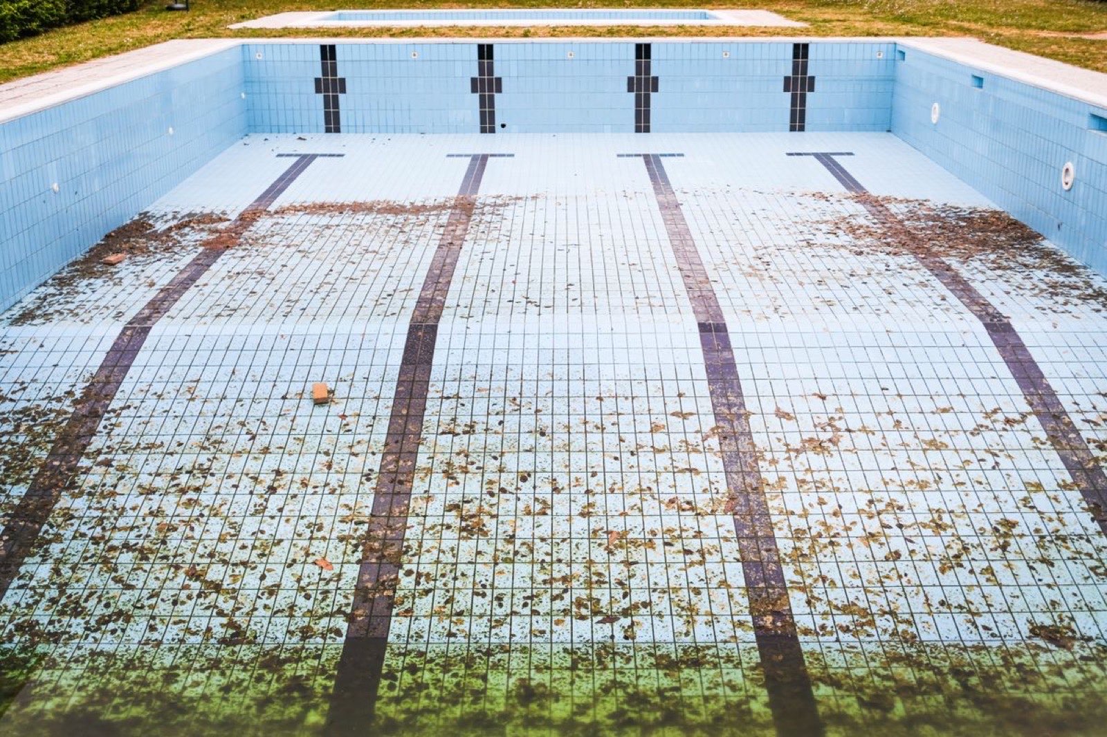 Drained swimming pool in need of professional pool repair and resurfacing service in Spring Valley, Las Vegas